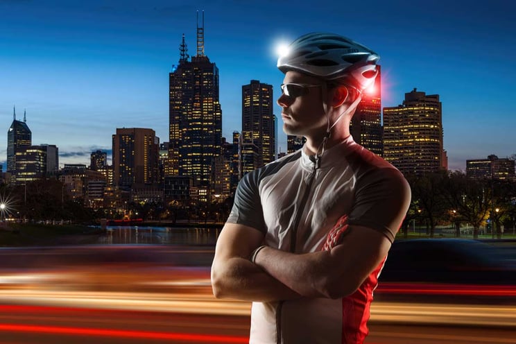 Cyclist with helmet lights